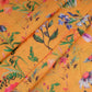 Marigold Yellow Muslin Silk Fabric with Tropical Floral Print (1 Mtr)